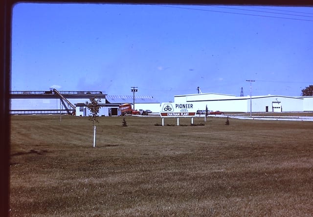 The Pioneer plant behind its wide lawn