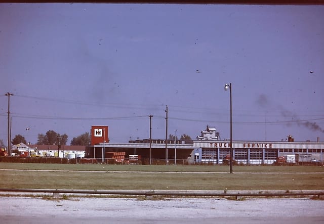 The International Harvester dealer and service signs along the strip